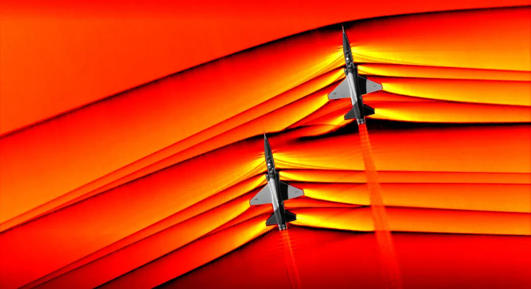 NASA schlieren photograph showing supersonic shockwaves from two T-38 aircraft interacting in flight